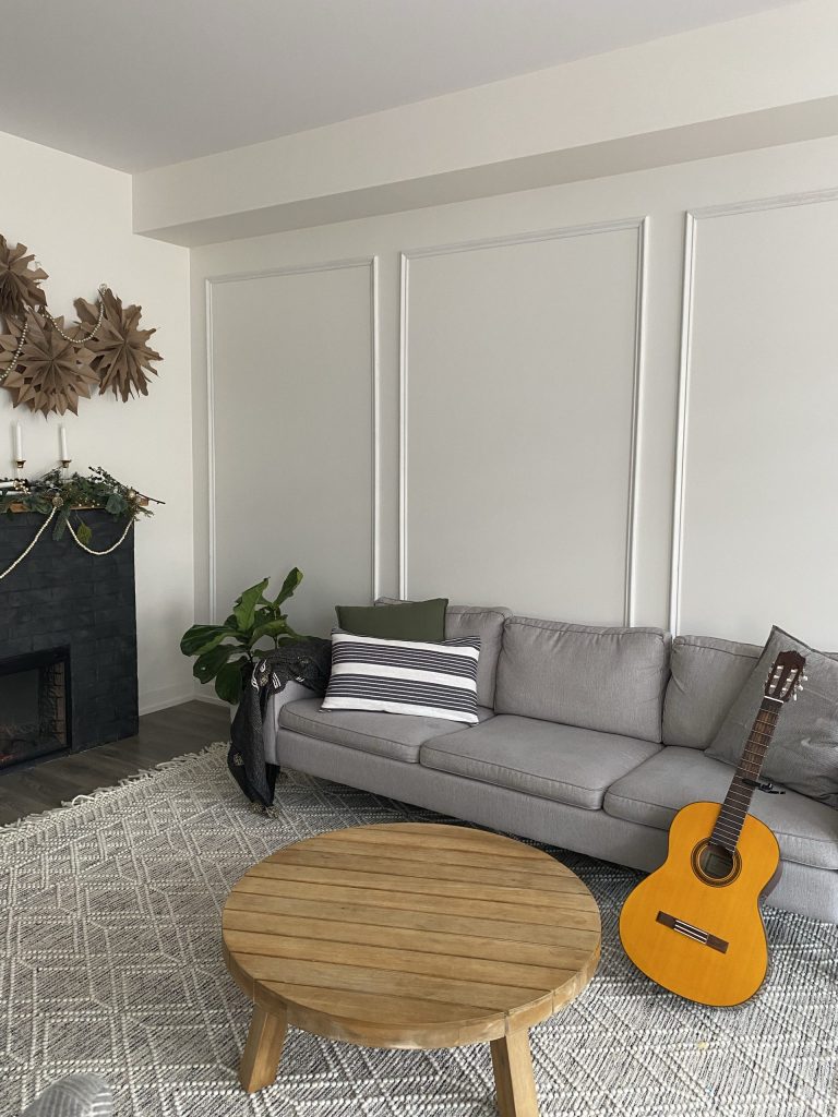 My living room accent wall with wainscotting