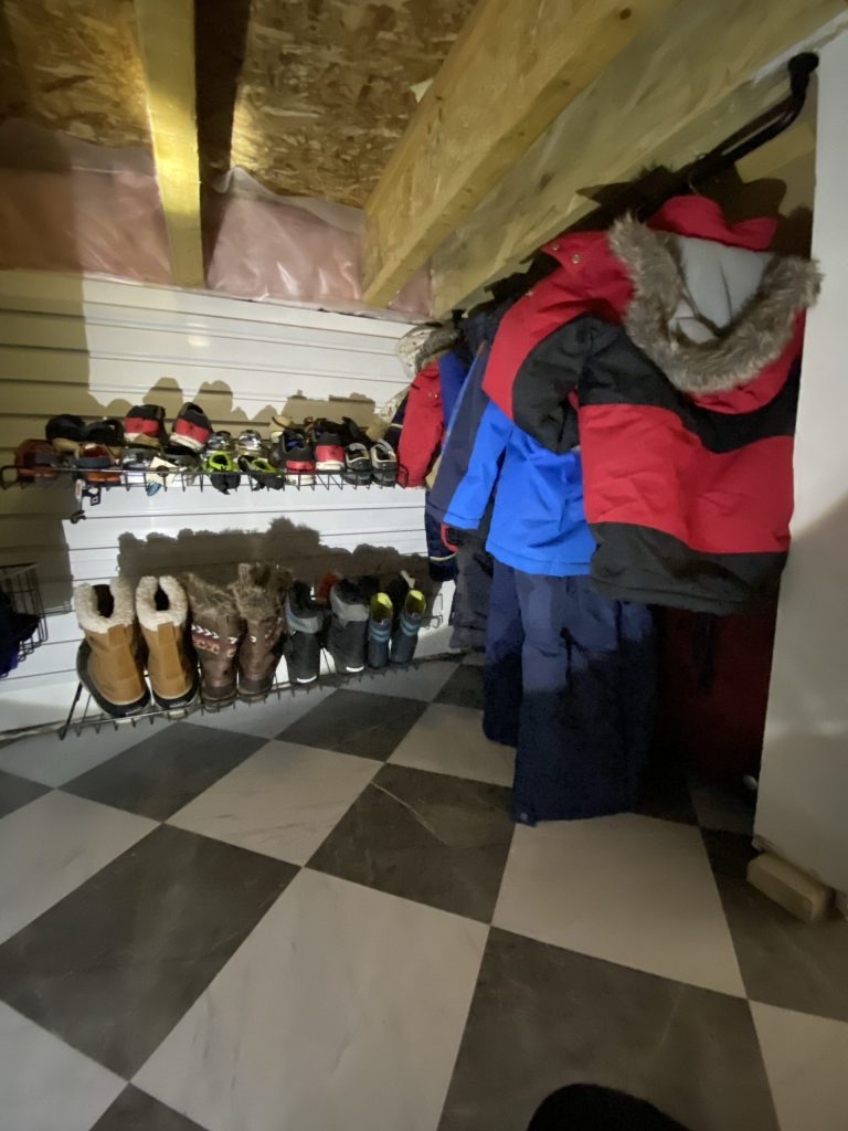 under the stairs storage organization for shoes and boots